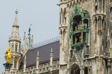 New Town Hall at Marienplatz in Munich Germany with Pope John Paul statue