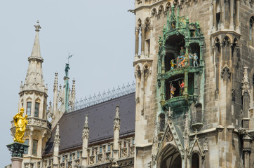 Fototapeta premium New Town Hall at Marienplatz in Munich Germany with Pope John Paul statue