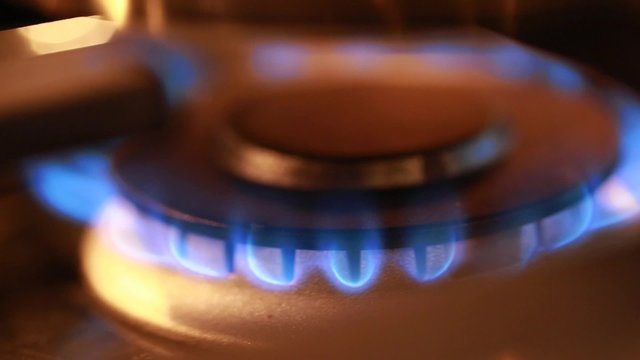 flame on a gas stove in kitchen