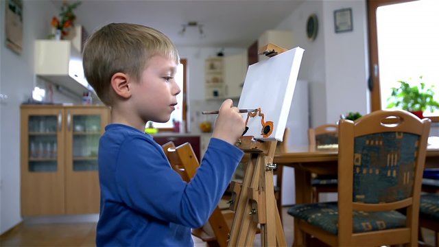 Slow Motion Wide Child Drawing Motorcycle on Canvas