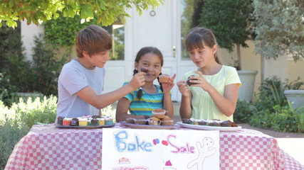 Children Holding Bake Sale 