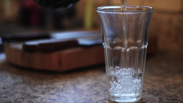 Water pouring into glass
