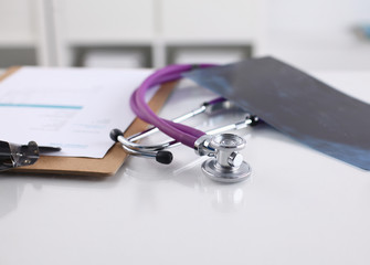 Doctor&amp;amp;amp;amp;#39;s stethoscope  with folder on the