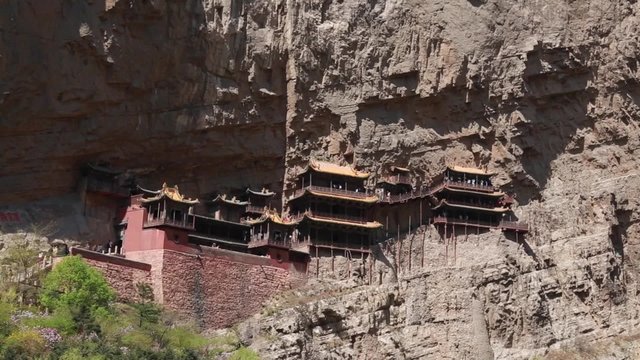 hanging temple at datong china with tourists