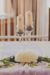 white wedding candles with beautiful lavanda flowers