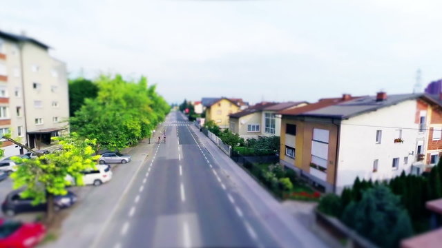 Overflight of few bikers on city street