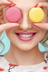 Fototapeta premium Beautiful young girl is making fun with sweet food