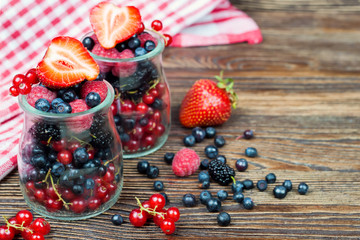 Fototapeta na wymiar mixed berries in in a glass jar