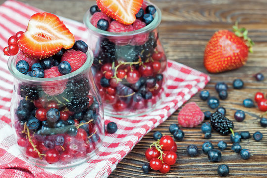mixed berries in in a glass jar