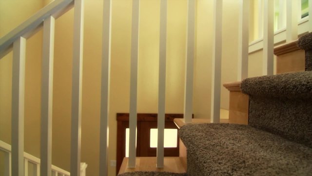 Dolly shot of stairs in a new home