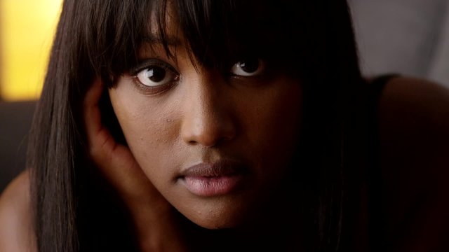 Sultry black woman looking at camera