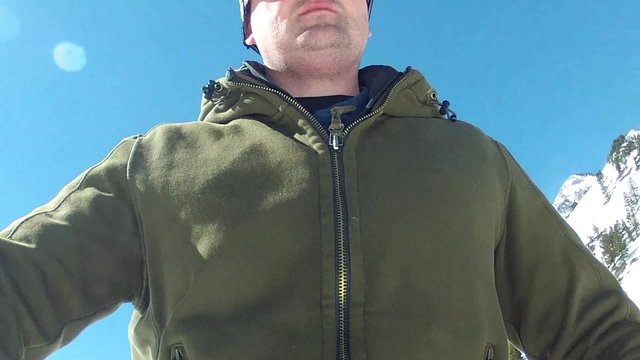man skiing from waist up at resort