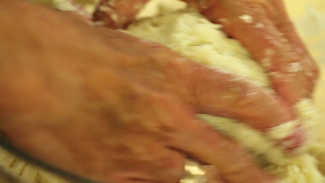 mixing together ingredients into pie crust