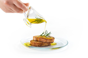 Fototapeta na wymiar Serving olive oil on bread 