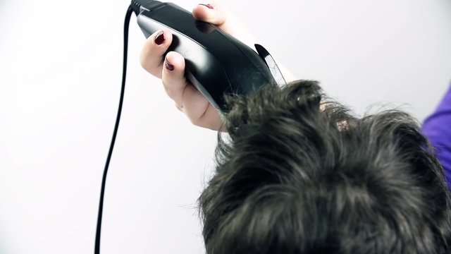 Trimming Client Hair on White Background Slow Motion