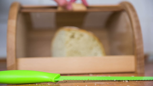 Bread cutting from breadbox