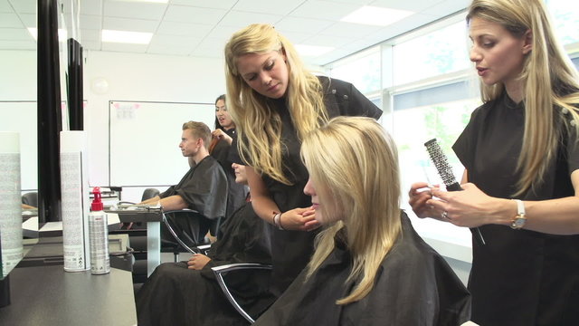 Teacher Training College Students In Hairdressing Class