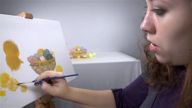 Artist Carefully Drawing on Canvas