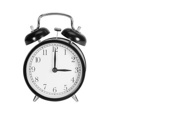 Three O' Clock on alarm clock isolated on white