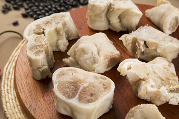 Foot raw pork on wooden background