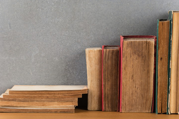 stack of books on wood table