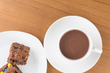 a cup of chocolate with brownie