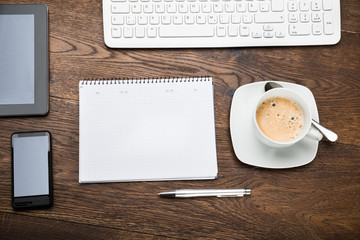 Digital Tablet With Diary And Cup Of Tea