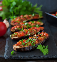 Baked eggplant with tomatoes, garlic and paprika