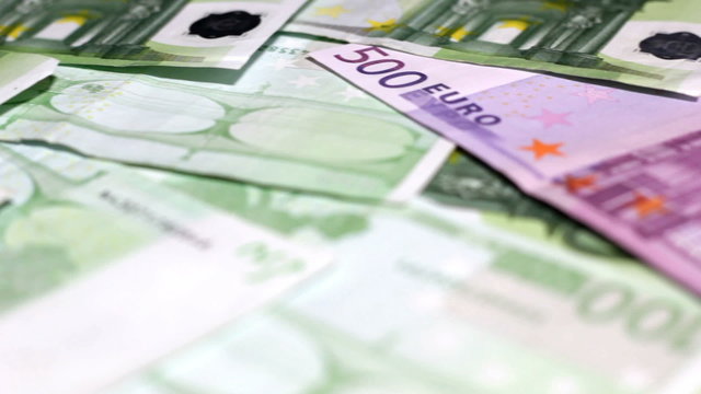 Hundreds of Euro money sliding over
