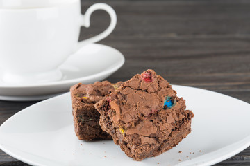 brownies in plate on wood table