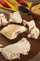 Ear raw pork on wooden background