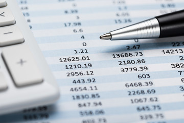 Financial Statement With Calculator And Pen