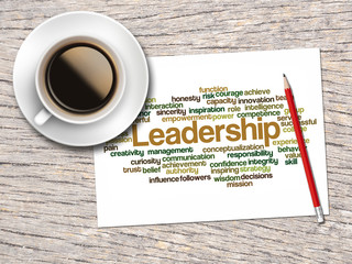 Coffee, Pencil And A Note Contain Word Clouds Of Leadership And