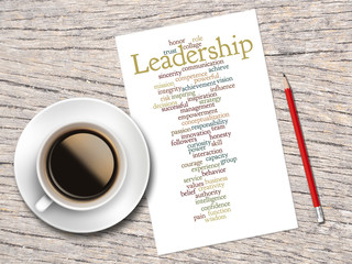 Coffee, Pencil And A Note Contain Word Clouds Of Leadership And