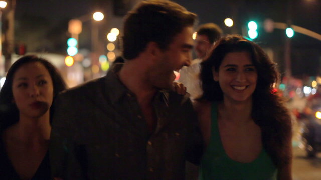 Group Of Friends Enjoying Night Out Together
