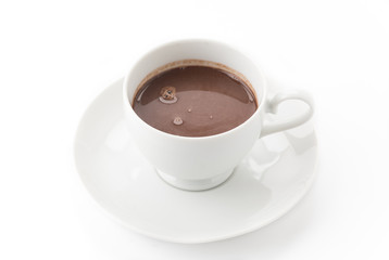 a cup of chocolate on white