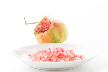 Fresh Pomegranate on white background