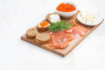 appetizers - salted salmon, red caviar, toast and cream cheese