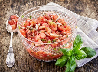 chopped tomatoes with onions and basil
