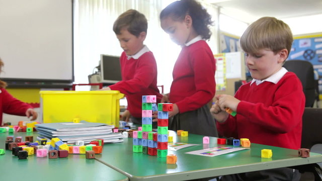 Pupils Working With Coloured Blocks