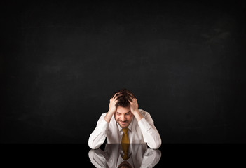 Businessman sitting at a desk