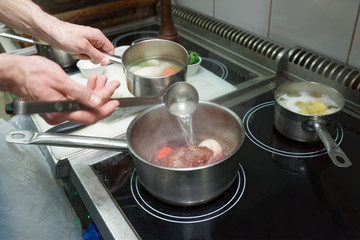 Chef is cooking ox tail