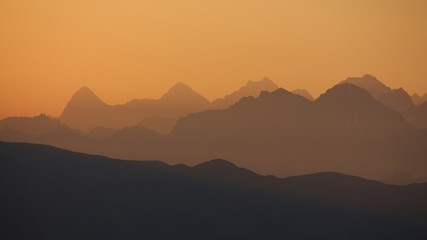 Fototapeta na wymiar Golden sunrise near Gstaad