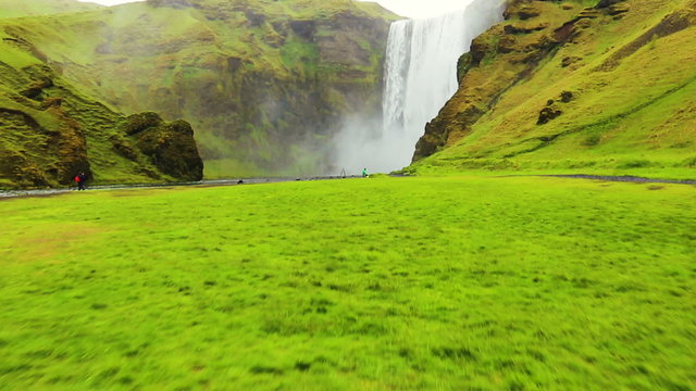 Drone Approach to Amazing Powerfull Waterfall. Natural Beauty in Nature. Skogafoss
