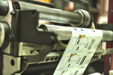 Fotobehang Printing labels on offset machine © Aleksander