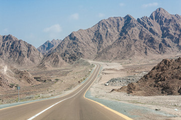 Long road stretching across mountains