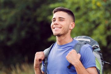 Young tourist hiking alone