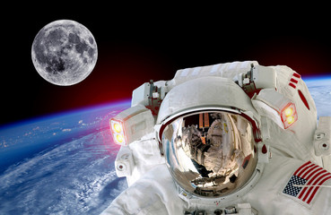 Astronaut spaceman isolated helmet space selfie earth moon. Elements of this image furnished by NASA. - 86868572