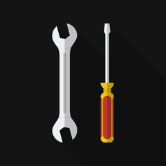 Flat screwdriver, wrench with long shadow