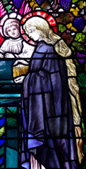 St. Mary and an angel in stained glass